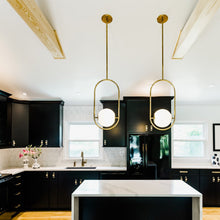 Load image into Gallery viewer, Everley Pendant Light in dining room.
