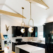 Load image into Gallery viewer, Everley Pendant Light in dining room.
