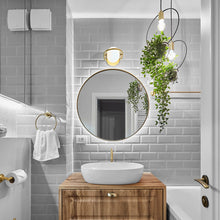 Load image into Gallery viewer, Everley Wall Light in bathroom.
