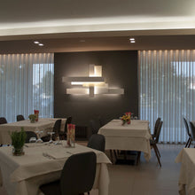 Load image into Gallery viewer, Fields Wall Light in dining room.
