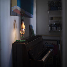 Load image into Gallery viewer, Filo LED Table Lamp in living room.

