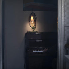 Load image into Gallery viewer, Filo LED Table Lamp in living room.
