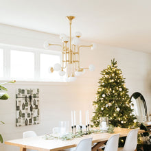 Load image into Gallery viewer, Flemming LED Chandelier in dining room.
