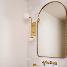 Load image into Gallery viewer, Flemming LED Wall Light in bathroom.
