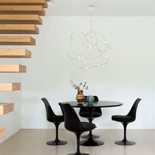 Load image into Gallery viewer, Flock of Light LED Chandelier in dining room.
