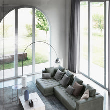 Load image into Gallery viewer, Arco Floor Lamp in living room.
