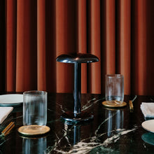 Load image into Gallery viewer, Gustave LED Table Lamp in restaurant.

