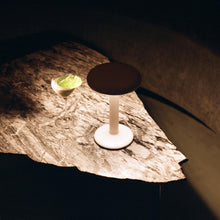 Load image into Gallery viewer, Gustave LED Table Lamp in restaurant.
