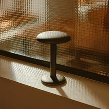 Load image into Gallery viewer, Gustave LED Table Lamp in restaurant.
