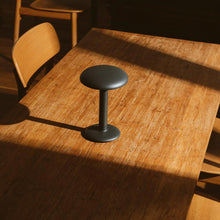 Load image into Gallery viewer, Gustave LED Table Lamp in restaurant.
