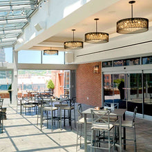 Load image into Gallery viewer, Fiona Drum Pendant Light in restaurant.
