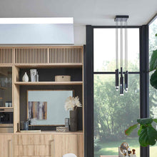 Load image into Gallery viewer, Harmony LED Pendant Light in living room.
