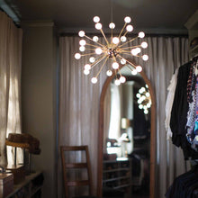 Load image into Gallery viewer, Impulse LED Chandelier in dressing room.

