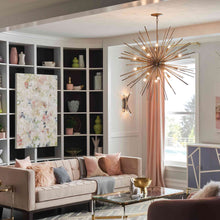 Load image into Gallery viewer, Tryst Chandelier in living room.
