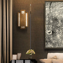 Load image into Gallery viewer, Fury LED Wall Light in living room.

