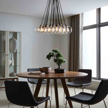 Load image into Gallery viewer, Gambit Multi Light Chandelier in dining room.
