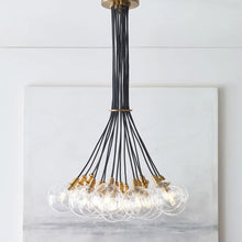 Load image into Gallery viewer, Gambit Multi Light Chandelier in dining room.
