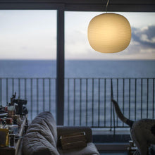 Load image into Gallery viewer, Gem Pendant Light in living room.
