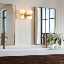 Load image into Gallery viewer, Londyn LED Vanity Wall Light in bathroom.
