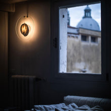 Load image into Gallery viewer, Gioia LED Wall Light in living room.
