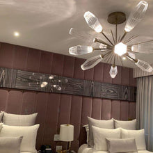 Load image into Gallery viewer, Aalto Oval Starburst LED Chandelier in bed room.
