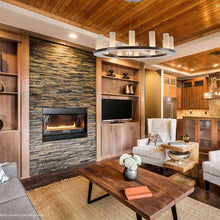 Load image into Gallery viewer, Corona Ring LED Chandelier in living room.

