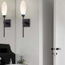 Load image into Gallery viewer, Fiori LED Wall Light in bathroom.
