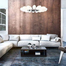 Load image into Gallery viewer, Fiori Radial Ring LED Chandelier in living room.
