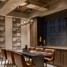 Load image into Gallery viewer, Gem Bezel LED Linear Pendant Light in dining room.
