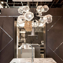 Load image into Gallery viewer, Gem Oval Starburst LED Chandelier in Kitchen.
