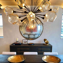 Load image into Gallery viewer, Gem Oval Starburst LED Chandelier in dining Room.
