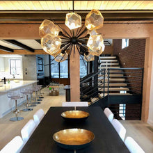 Load image into Gallery viewer, Gem Oval Starburst LED Chandelier in dining Room.
