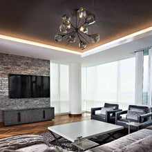 Load image into Gallery viewer, Gem Starburst LED Chandelier in living room.

