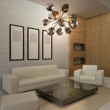 Load image into Gallery viewer, Gem Starburst LED Chandelier in living room.
