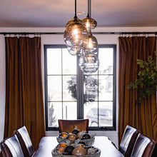 Load image into Gallery viewer, Misto Linear Pendant Light in dining room.

