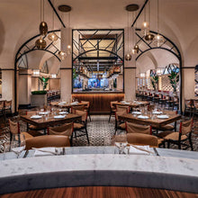 Load image into Gallery viewer, Misto Round Multi Light Pendant Light in restaurant.
