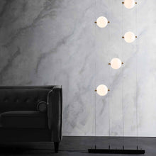Load image into Gallery viewer, Abacus Floor to Ceiling Plug-In LED Light in living room.
