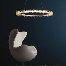 Load image into Gallery viewer, Anemone LED Pendant Light in living room.
