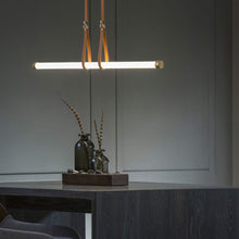 Load image into Gallery viewer, Belmont Linear LED Pendant Light in living room.
