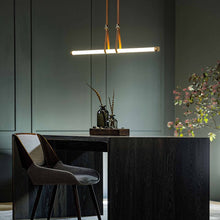 Load image into Gallery viewer, Belmont Linear LED Pendant Light in living room.
