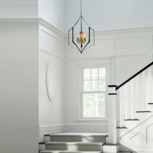 Load image into Gallery viewer, Carousel Chandelier in living room.
