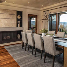 Load image into Gallery viewer, Cascade LED Pendant Light in living room.
