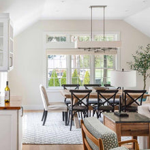 Load image into Gallery viewer, Cavaletti Pendant Light in dining room.

