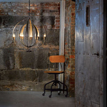 Load image into Gallery viewer, Cirque Chandelier in living room.
