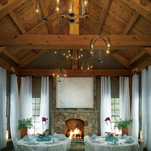 Load image into Gallery viewer, Cirque Chandelier in living room.
