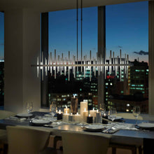 Load image into Gallery viewer, Cityscape Large LED Pendant Light in living room.
