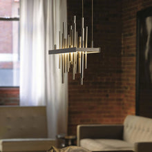 Load image into Gallery viewer, Cityscape LED Pendant Light in living room.
