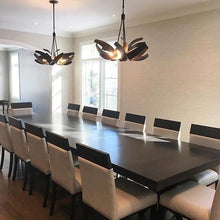 Load image into Gallery viewer, Corona Brass Accent Pendant Light in office.
