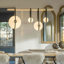 Load image into Gallery viewer, Derby Linear LED Pendant Light in dining room.
