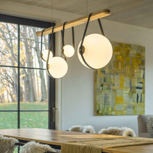 Load image into Gallery viewer, Derby Linear LED Pendant Light in dining room.
